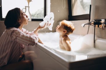 Mother,Washing,Little,Son,In,Bathroom